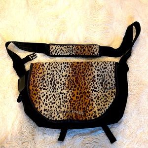 DaKine fuzzy leopard messenger bag